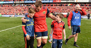 The sons of the late Munster Rugby head coach Anthony Foley, Tony, left, and Dan, join CJ Stander, and the rest of the squad on the field to sing ’Stand Up and Fight’ after the European Rugby Champions Cup Pool 1 Round 2 match between Munster and Glasgow Warriors at Thomond Park in Limerick.
