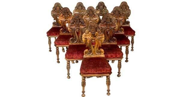 Eleven unusual Irish 19th century walnut chairs with the crest of the Barry family of Buttevant