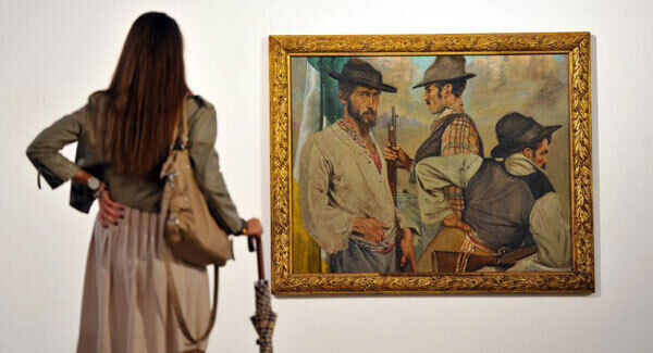 A visitor examines Sean Keating’s ‘Men of the West’ when it was on show at the Crawford Art Gallery, Cork. Keating was a favourite painter of the Irish State whose work has stood the test of time. Picture: Daragh Mc Sweeney/Provision A visitor examines Sean Keating’s ‘Men of the West’ when it was on show at the Crawford Art Gallery, Cork. Keating was a favourite painter of the Irish State whose work has stood the test of time. Picture: Daragh Mc Sweeney/Provision