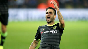 Cesc Fabregas offers extra help as Leicester lose