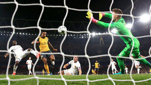 Theo Walcott wings in with a double as Arsenal delight in win over Basel