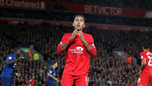 Bitter rivals fail to fire in Anfield cauldron