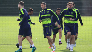 Mesut Ozil can become Arsenal legend like Dennis Bergkamp, says Arsene Wenger 