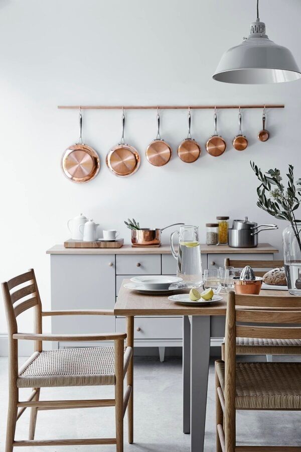 Where dining settles in the kitchen, lean Scandinavian style is a persistent high street favourite. Jasper Conran Farrington cabinet, now reduced to €784, carver chair €294, pair of dining chairs €392, copper pans €28-€84, all from Debenhams, debenhams.ie. To channel this look in investment buys, go for freestanding furniture without pretension by an Irish maker. For a full listing of cabinet-makers countrywide go to Design & Craft Council of Ireland’s listings at dccoi.ie.