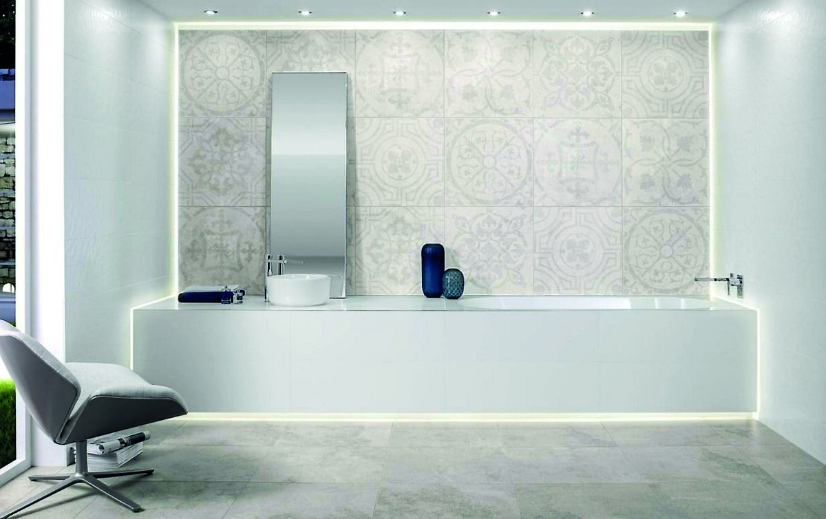Dedicated track lighting and one continuous line, with Villeroy & Boch fittings framed to deliver hotel chic home. Newtown 60x60 tiles, €44/m2, Newtown Décor tiles (on wall behind bath) €57/m2; Oberon 1800x800 bath €995; Architectura basin €250; basin mixer €655; spout & Mixer valve €960. Original Bathrooms & Tiles, Cork, obcork.ie Dedicated track lighting and one continuous line, with Villeroy & Boch fittings framed to deliver hotel chic home. Newtown 60x60 tiles, €44/m2, Newtown Décor tiles (on wall behind bath) €57/m2; Oberon 1800x800 bath €995; Architectura basin €250; basin mixer €655; spout & Mixer valve €960. Original Bathrooms & Tiles, Cork, obcork.ie