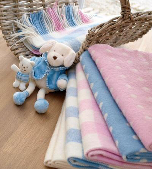 Foxford’s baby range uses soft lambswool in a range featuring blues and pinks woven into spots against a plain background, or in check patterns as a nod to traditional designs (€35 at Brown Thomas, Arnotts, Kilkenny and www.foxfordwoollenmill.com