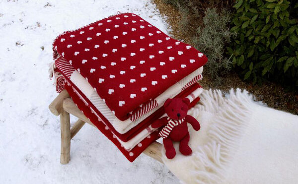 The Nordic Winter range of throws and blankets from Foxford features a red and white colourway in checks, spots and hearts for warming wooliness (from €83 at Brown Thomas, Kilkenny and at www.foxfordwoollenmill.com