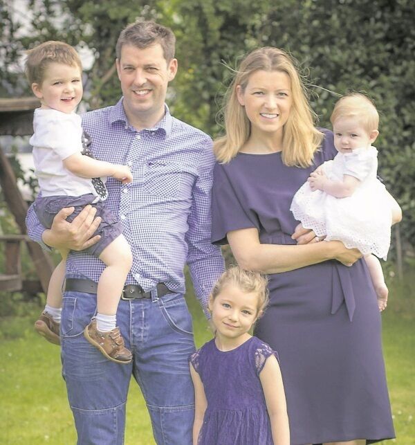 John Walsh, with wife Edel, and children Fírinne, 5, Ríain, 3, and Saorla, 8 months
