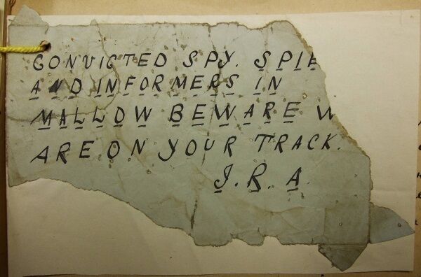 A scrap of paper found on Macpherson’s body issues a warning.