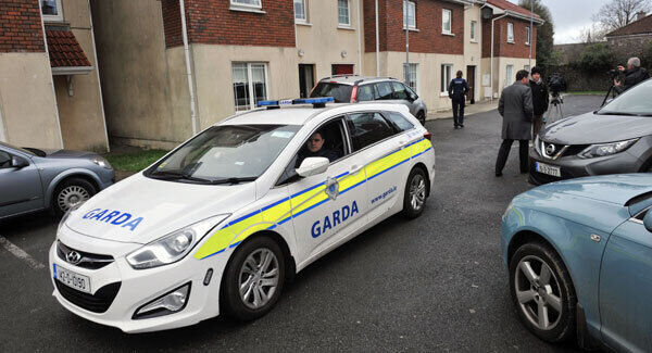 Gardaí at the Cornacchia house in Deermount, Cork City, where 16-year-old Michael died. Picture: Daragh Mc Sweeney.