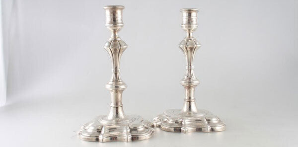 These George II candlesticks were made in Dublin around 1745 by John Moore.