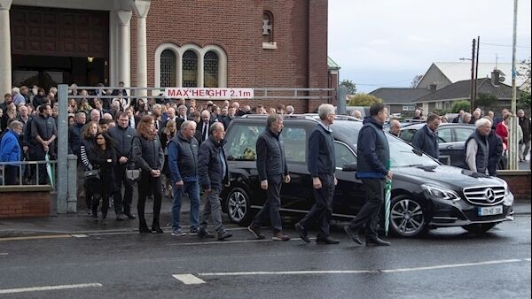 Family members console each other at the funeral Mass of John Finnan. Picture: Colin Keegan, Collins Dublin Family members console each other at the funeral Mass of John Finnan. Picture: Colin Keegan, Collins Dublin
