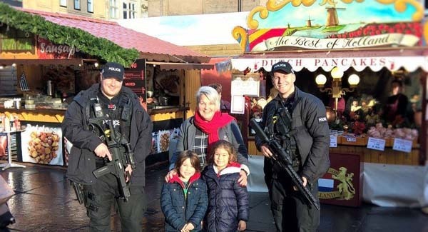 People get upset about the police being armed at a Christmas market, officers hit back with smiles