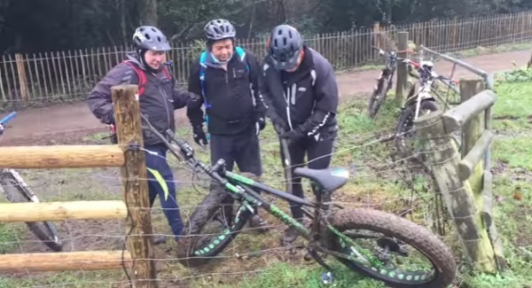 WATCH: Three lads comedically try to untangle a bike from an electric fence