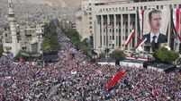Assad supporters stage large rally in Damascus
