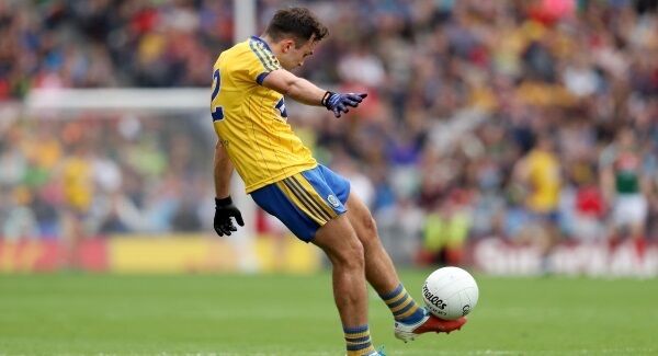 Roscommon’s Tadgh O’Rourke kicks the final point of the game. Picture: Oisin Keniry