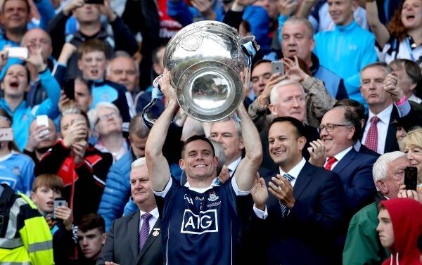 Dublin captain Stephen Cluxton holds the Sam Maguire aloft. Dublin captain Stephen Cluxton holds the Sam Maguire aloft.