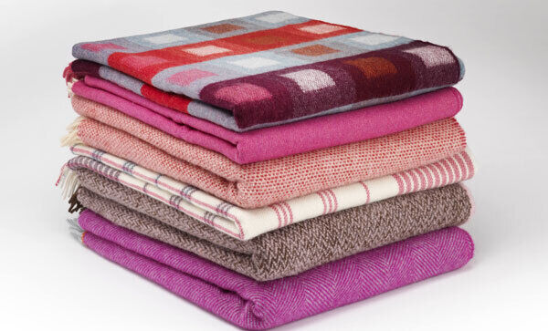 Magenta Collection featuring premium lambswool throws from McNutt of Donegal. Priced from €84.95.