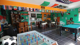 This Co Cork cottage has its very own bar at the end of the garden