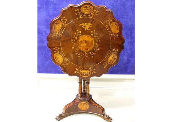 A tip up Killarney wood centre table at Hegarty’s sale in Bandon on Sunday week.