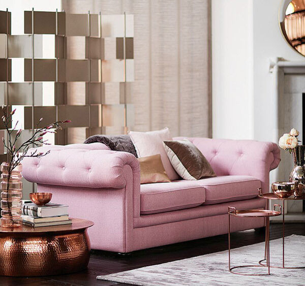 The Opera sofa from DFS (€1,279) adds colour to a neutal room with copper side tables, bowls and lighting details to introduce warmth and texture. The Opera sofa from DFS (€1,279) adds colour to a neutal room with copper side tables, bowls and lighting details to introduce warmth and texture.