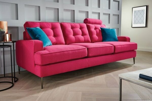 The Conran Isla sofa pairs traditional upholstery buttoning with a modern frame work design. Teal cushions are used for contrast (from €1,299). The Conran Isla sofa pairs traditional upholstery buttoning with a modern frame work design. Teal cushions are used for contrast (from €1,299).