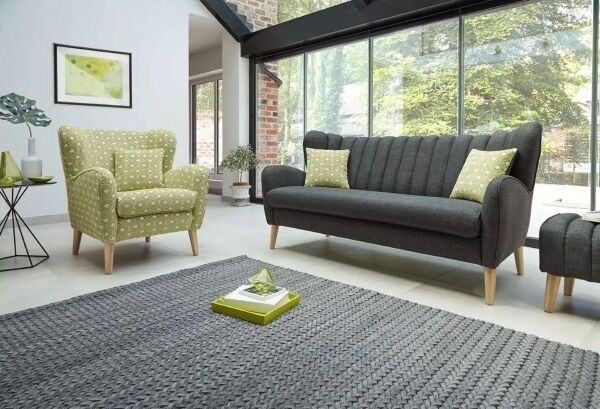 EZ Living’s Dune sofa is a compact model with heavily ribbed upholstery and light wood legs to add interest and texture. The dark fabric provides a background to off-set pattern accents which complement other upholstery (€599). EZ Living’s Dune sofa is a compact model with heavily ribbed upholstery and light wood legs to add interest and texture. The dark fabric provides a background to off-set pattern accents which complement other upholstery (€599).