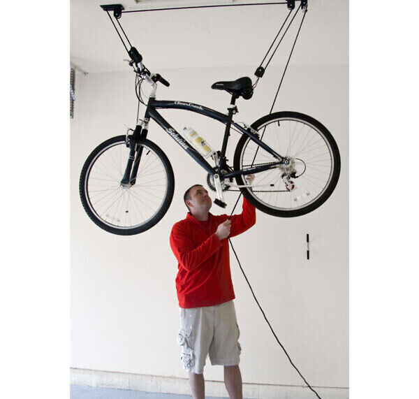 Bikes can go up, up and away if a standard hook on the wall won’t do. Try Halfords for a DIY rope system. Picture: Wayfair US