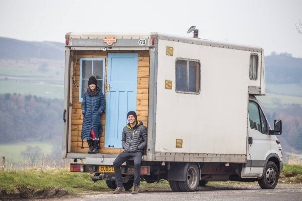 Brittany Rouille and Drew Neumann in Hector, the Quirky Camper, their honeymoon transport of choice.