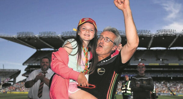 Carlow hurling manager Colm Bonnar celebrates their Joe McDonagh Cup success with his daughter