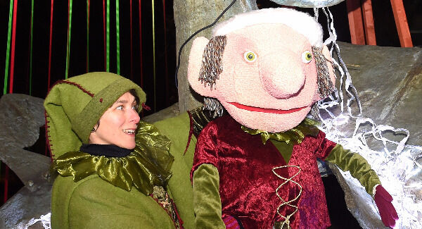 Cassandra Davis and one of Dowtcha’s elf puppets at Glow. Pictures: Larry Cummins