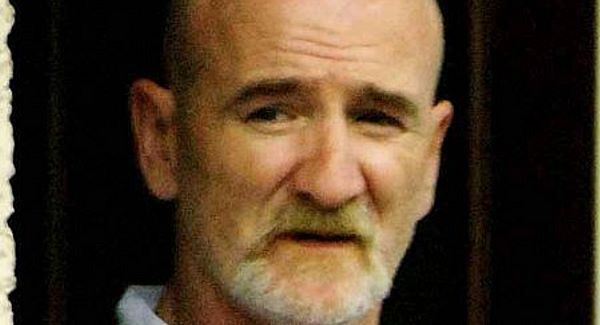 Police charge parents with murder of children in blaze
