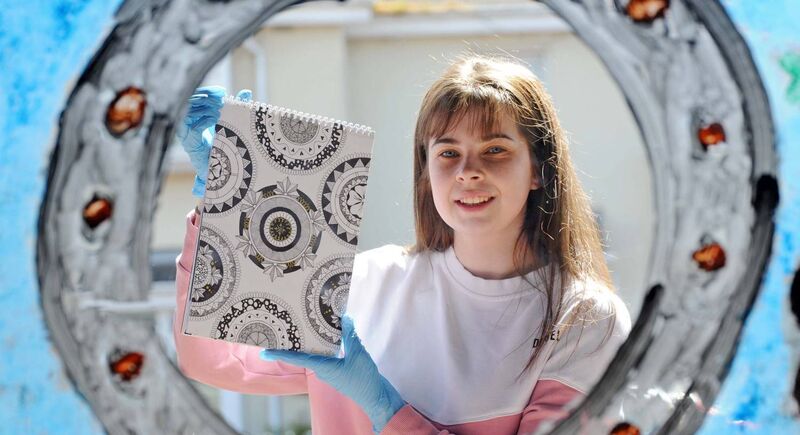 Rebecca White of Mahon CDP Creche, Cork, with mindfulness art drawings she designed for older people which were included in Mahon Community Development Project gift packs for delivery to older people. Other types of gift packs were also delivered to children from the creche. Picture Denis Minihane Rebecca White of Mahon CDP Creche, Cork, with mindfulness art drawings she designed for older people which were included in Mahon Community Development Project gift packs for delivery to older people. Other types of gift packs were also delivered to children from the creche. Picture Denis Minihane