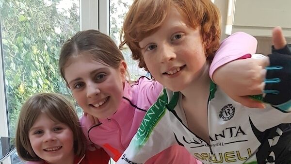 James with his sister Elise and his brother Benjamin after completing the cycle.