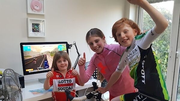 James with his sister Elise and his brother Benjamin after completing the cycle.
