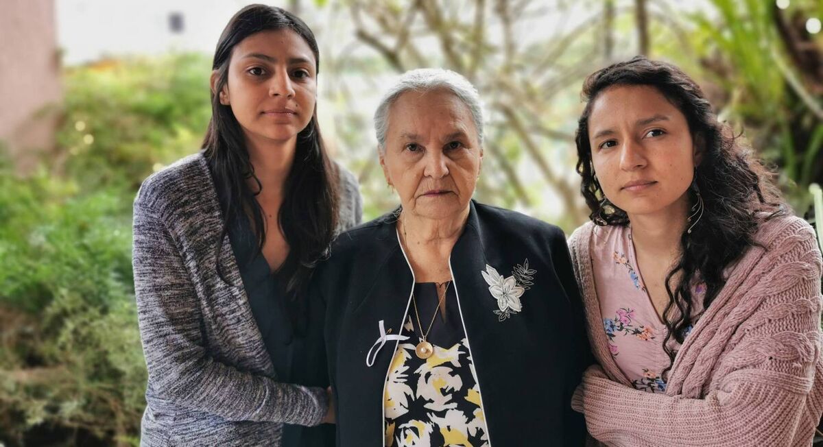 Berta’s daughters Laura, left, and Bertita, right, with their grandmother Austra at her home in La Paz, Honduras.