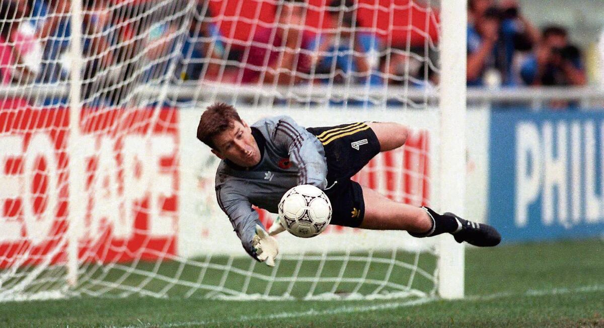 Packie Bonner saves a penalty from Daniel Timofte in the shootout against Romania in the 1990 World Cup. “For their last kick my focus was entirely on Packie. I was incredibly fortunate that the save was on the side closest to me so he ended up diving towards my position,” says Billy Strickland.