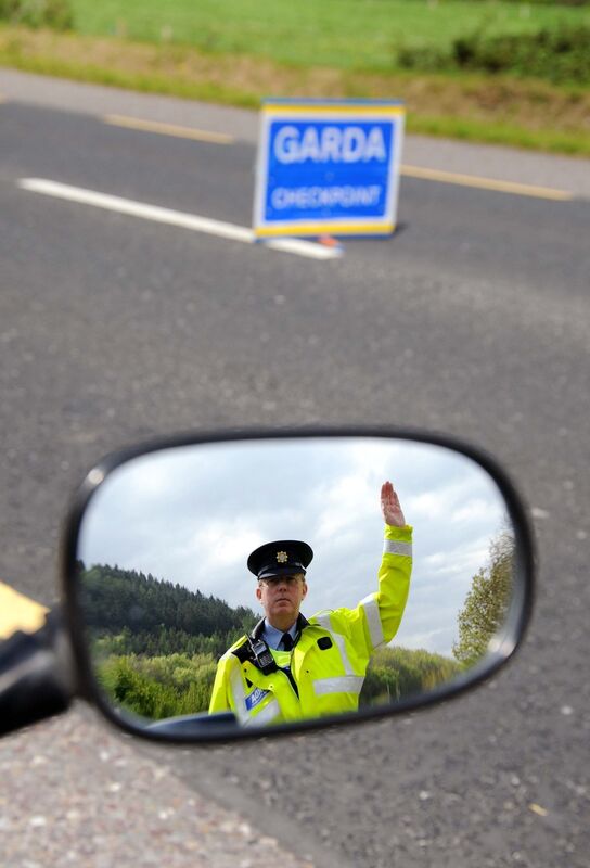Garda Conor Gately, a community Garda in Fermoy, Co. Cork, pictured at a Covid-19 Garda checkpoint near Fermoy. Picture Denis Minihane.