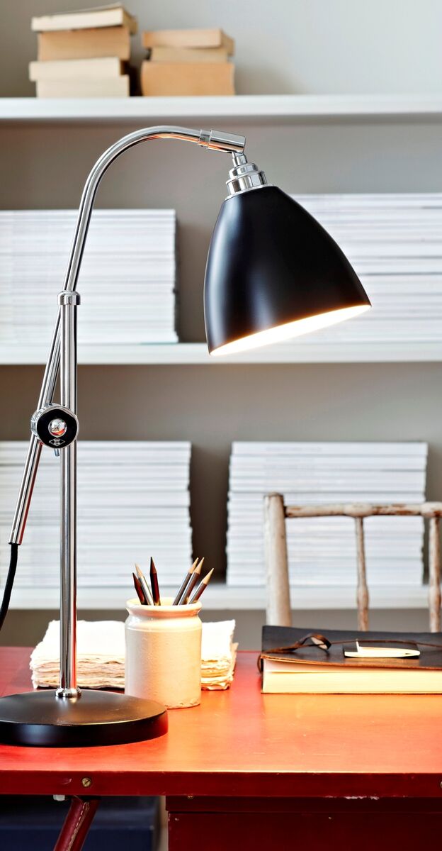 Lighting has a crucial part to play. Find a spot with the light in front or to the side of your screen and balance natural lighting with dedicated function light for paperwork where needed. Lamp €345 by Original BTC, originalbtc.com.