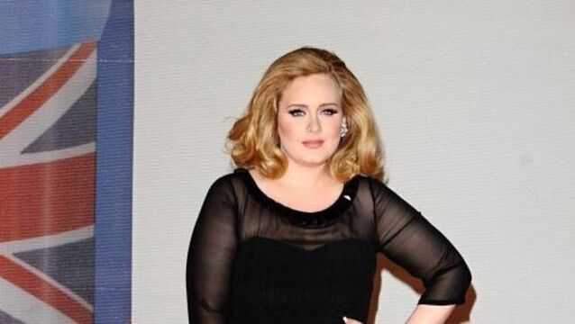 Adele double caps phenomenal year