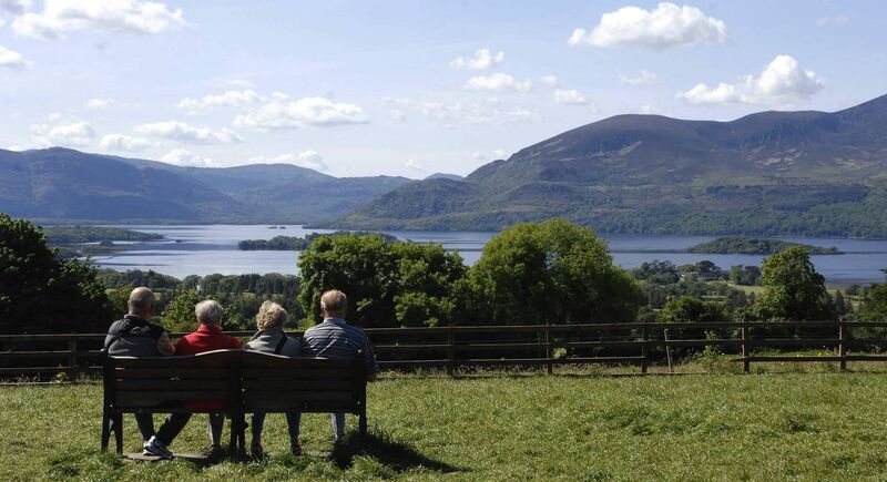 Tourists take in the magnificient view at Aghadoe Killarney in glorious May sunshine. The scene is one of the most photographed views in Ireland and the setting for many films. Pictures: Don MacMonagle
