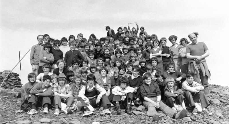 School group on top of Mount Brandon in Kerry Gaeltacht in 1974. Micheál Martin is 6th left, standing, in white polo-neck jumper. Picture Kevin Cummins. School group on top of Mount Brandon in Kerry Gaeltacht in 1974. Micheál Martin is 6th left, standing, in white polo-neck jumper. Picture Kevin Cummins.