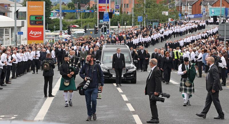 The funeral procession of senior Irish Republican and former leading IRA figure Bobby Storey following the funeral at St Agnes' Church in west Belfast.