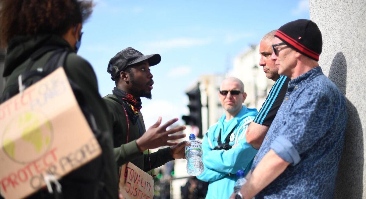 BLM demonstrators arguing with EDL supporters during a rally at Churchill statue in Parliament Square, London, today. Pic: Victoria Jones/PA Wire