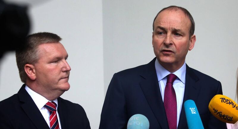 Finance Spokesperson Michael McGrath TD, Fianna Fail Leader Micheal Martin as he speaks to the media at Leinster House Dublin. Pic: Gareth Chaney / Collins Photos