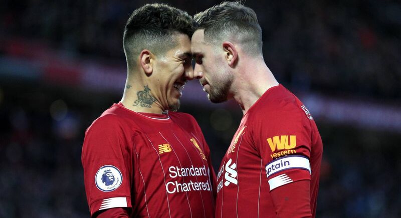TWO HEADS: Liverpool skipper Jordan Henderson (right) celebrates with workaholic front man Roberto Firmino, who forms part of the deadliest front three in the League. TWO HEADS: Liverpool skipper Jordan Henderson (right) celebrates with workaholic front man Roberto Firmino, who forms part of the deadliest front three in the League.