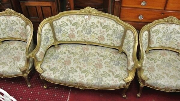 A Louis XV-style three-piece suite at Woodward's today.