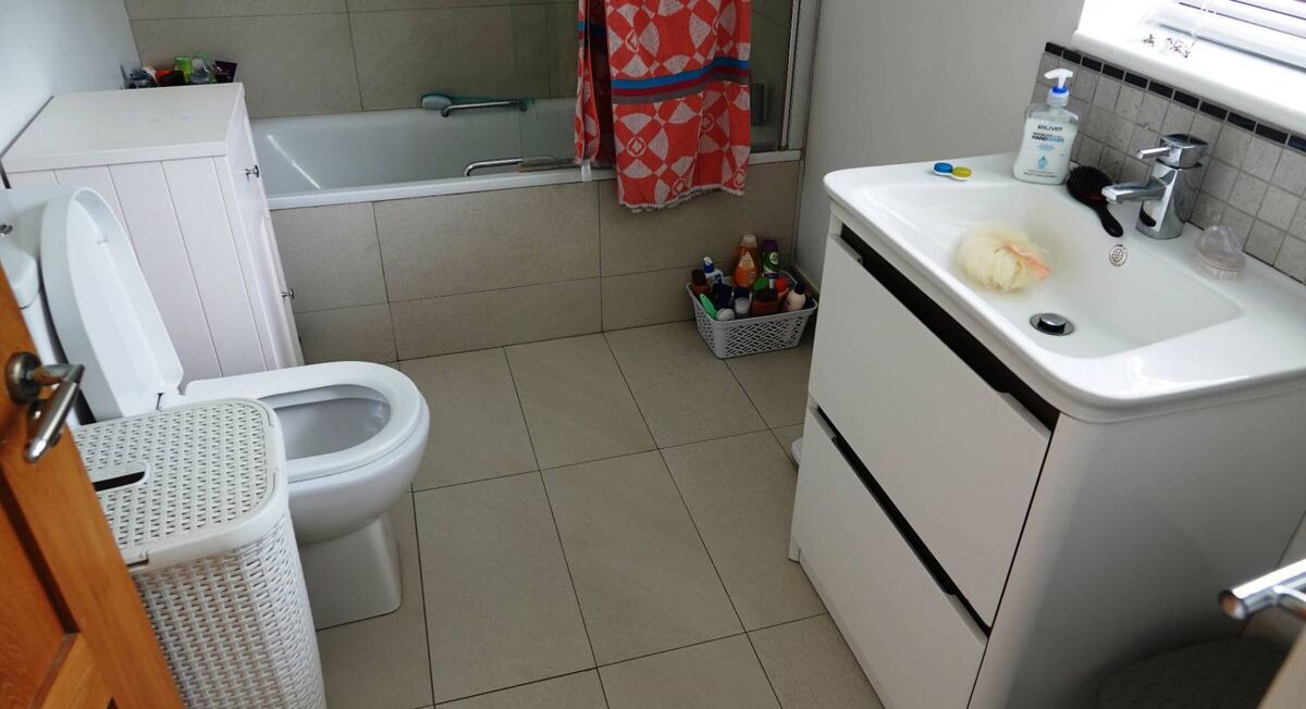 From toilet seat up and fish-bowl queasy to straight, neutral chic. One bathroom shot improved in five minutes taken low to straighten the verticals and shot from the next room. The colour balance here is deliberately cool and clean