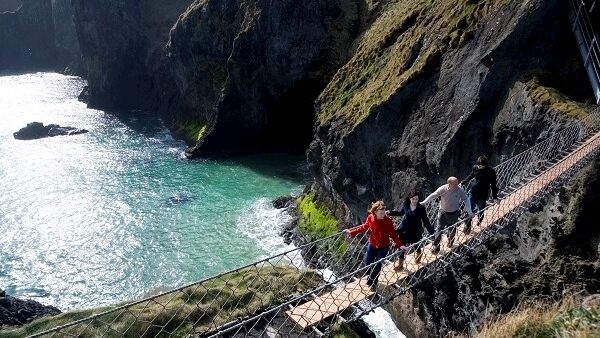 Traditionally fishermen erected the bridge to Carrick-a-Rede island over a 23m-deep and 20m-wide chasm to check their salmon nets. Today visitors are drawn here simply to take the rope bridge challenge! Traditionally fishermen erected the bridge to Carrick-a-Rede island over a 23m-deep and 20m-wide chasm to check their salmon nets. Today visitors are drawn here simply to take the rope bridge challenge!