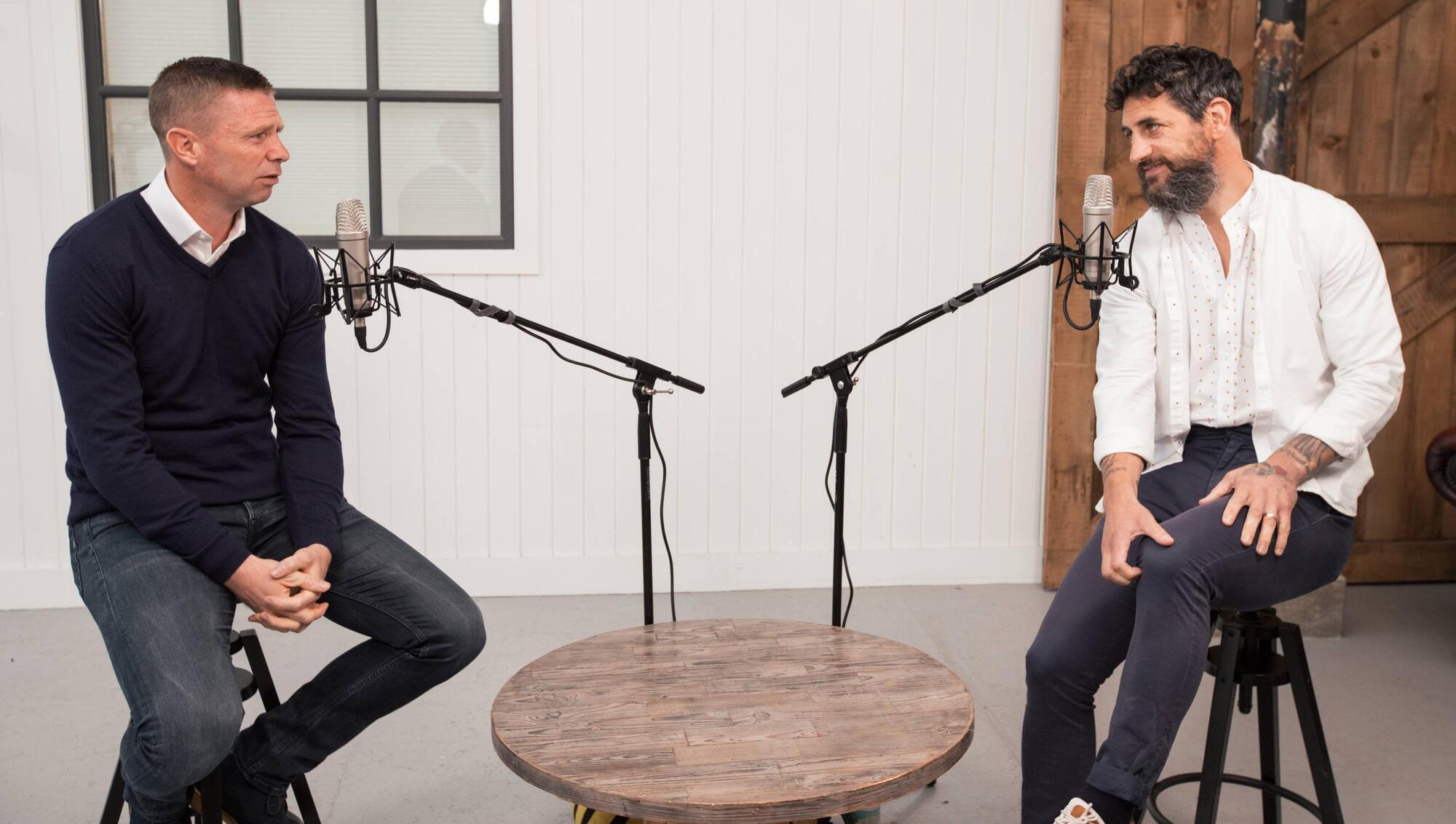 Paul Galvin speaking to fellow Kerry teammate Tomás Ó Sé during the recording of Comhra Le Tomás which is powered by Benetti Menswear Picture: Killian O'Sullivan, You4Reel.com.